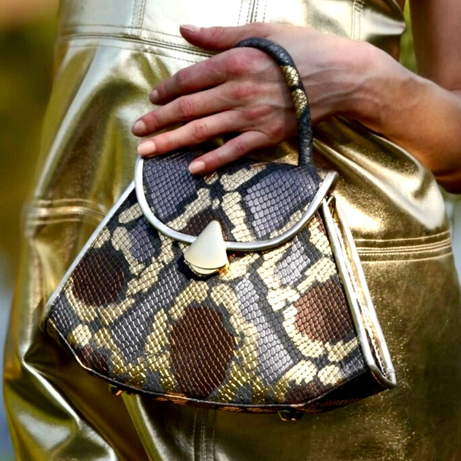 She's a Lady-Gold Snake